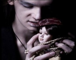 goth-boy-with-the-doll.jpg